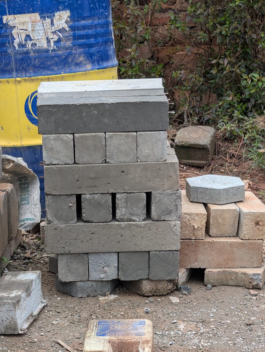 Stack of BOKSWA concrete blocks in the yard