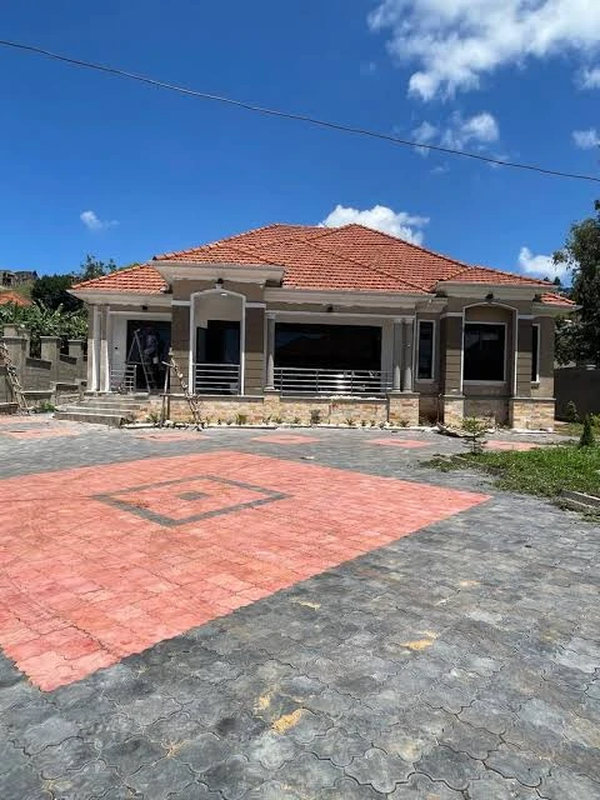 Paved compound laid in a red and grey panel pattern