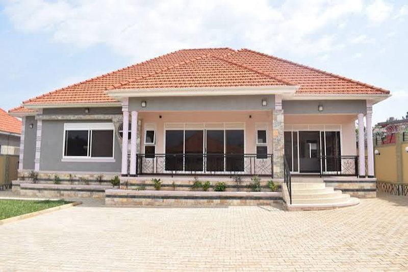 Completed home with a fully paved compound