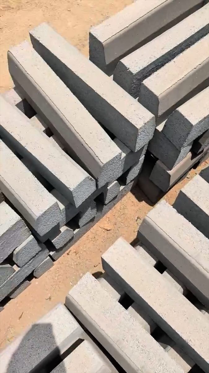 Stacked BOKSWA kerb units in the production yard